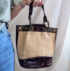 Stuart Weitzman tortoise straw purse.